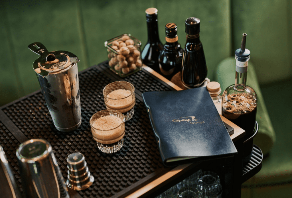 a bar with glasses and drinks on a table